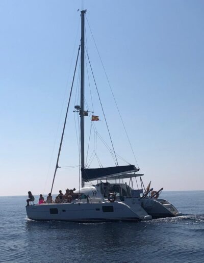 People enjoying a catamaran boat trip in Benalmádena