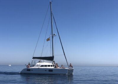 Enjoy a catamaran boat ride in Benalmádena, exploring the crystal-clear waters.
